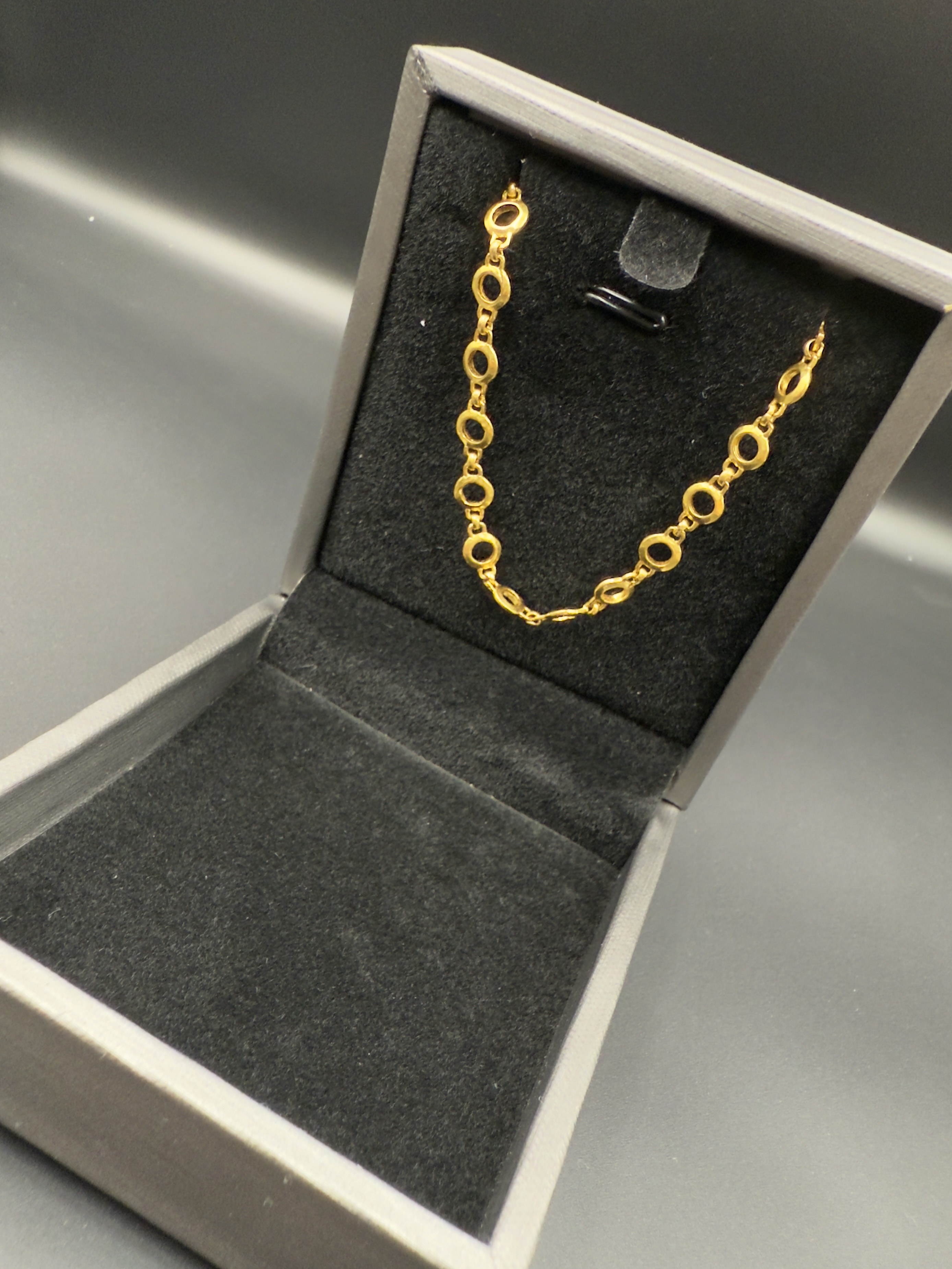 4.丁標：黃金手鍊